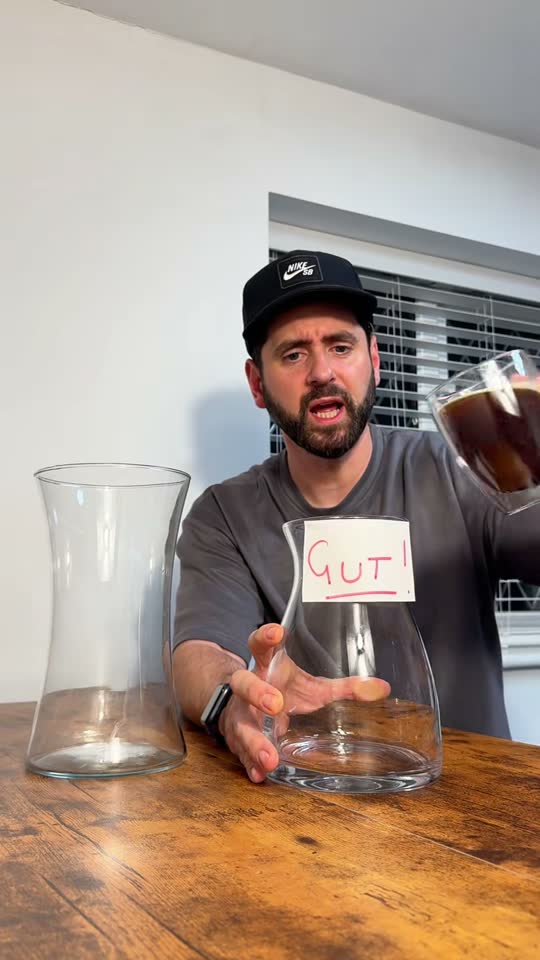 Matt filming a supplement demo at his kitchen table